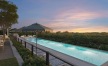 a pool with a building in the background