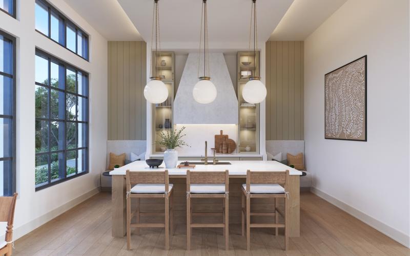 a community kitchen with a table and chairs